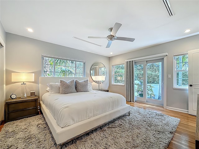 301 23rd Ave NE, Saint Petersburg, FL 33704 - bedroom with wood finished floors, multiple windows, recessed lighting, and a ceiling fan