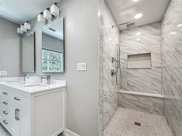 301 23rd Ave NE, Saint Petersburg, FL 33704 - full bathroom with double vanity, a walk in shower, and recessed lighting