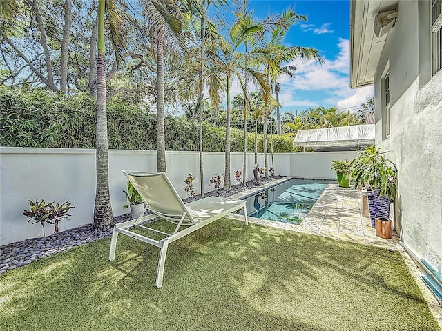 301 23rd Ave NE, Saint Petersburg, FL 33704 - view of swimming pool featuring a fenced backyard