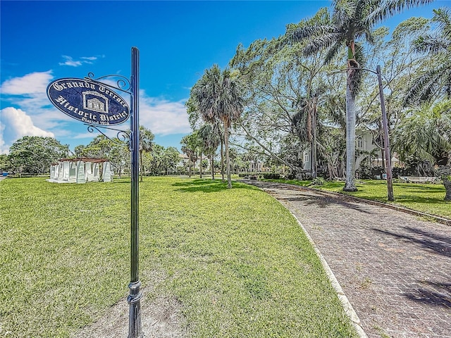 301 23rd Ave NE, Saint Petersburg, FL 33704 - view of community with a lawn