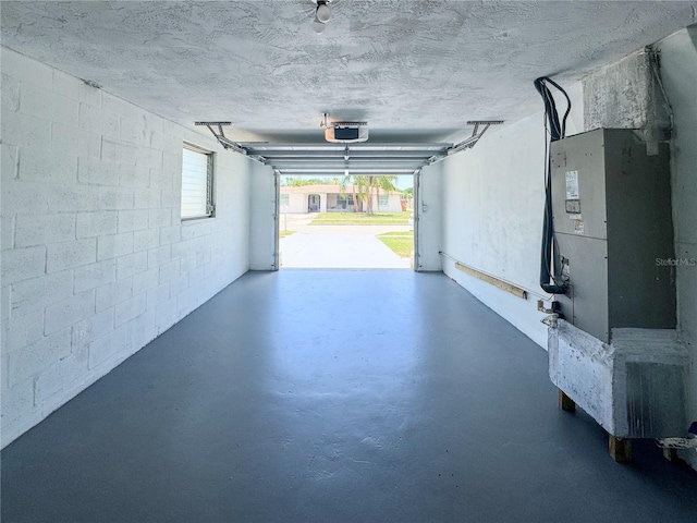 4638 Durney St, New Port Richey, FL 34652 - garage with a garage door opener, concrete block wall, and heating unit