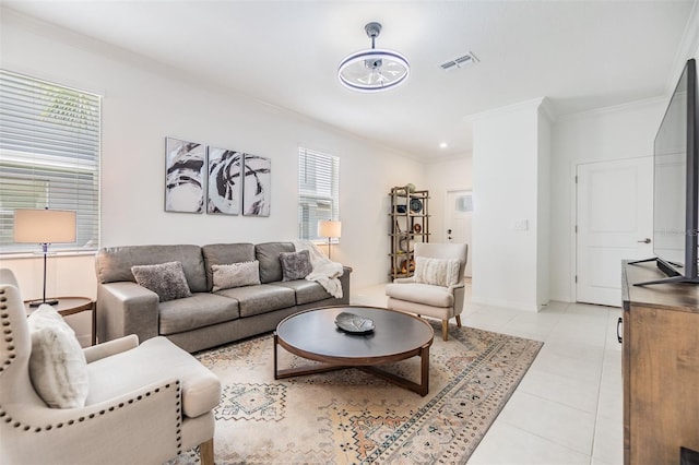 36414 Well Hill Way, Zephyrhills, FL 33541 - living room featuring ornamental molding and light tile patterned flooring
