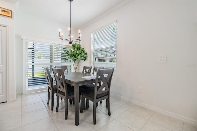 36414 Well Hill Way, Zephyrhills, FL 33541 - dining room with crown molding, a chandelier, healthy amount of natural light, and light tile patterned floors