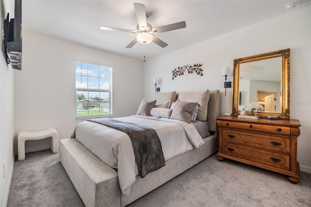36414 Well Hill Way, Zephyrhills, FL 33541 - bedroom with light colored carpet and a ceiling fan