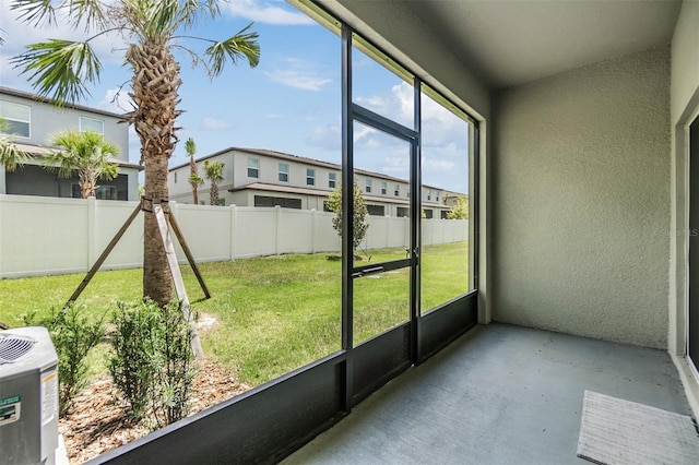 36414 Well Hill Way, Zephyrhills, FL 33541 - unfurnished sunroom with a residential view