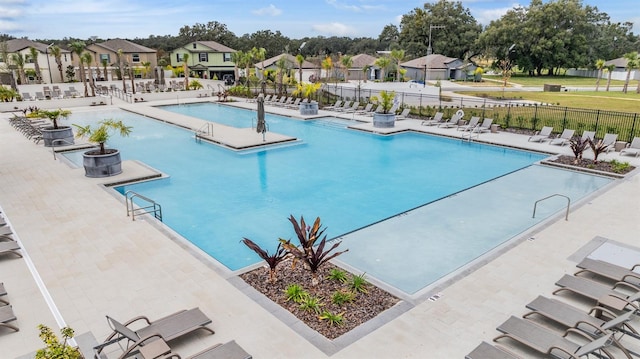 36414 Well Hill Way, Zephyrhills, FL 33541 - community pool featuring a residential view and a patio area