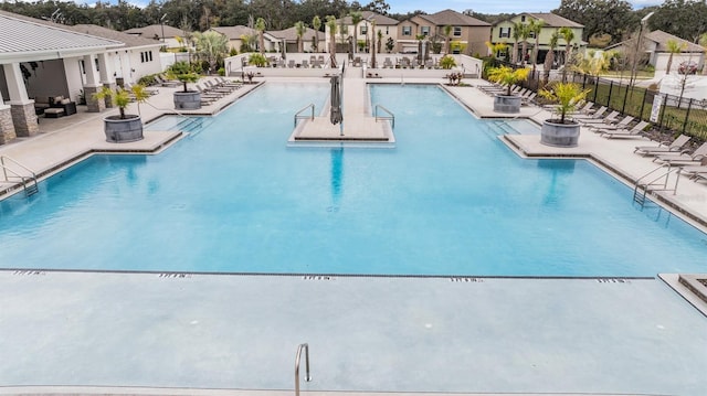 36414 Well Hill Way, Zephyrhills, FL 33541 - community pool with a residential view and a patio area