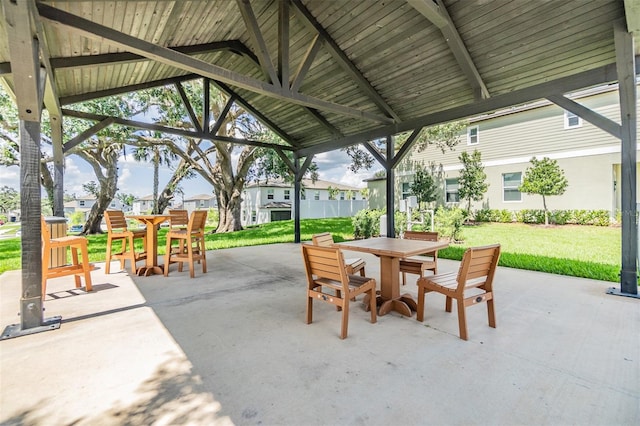36414 Well Hill Way, Zephyrhills, FL 33541 - view of patio with outdoor dining space, a gazebo, and a residential view