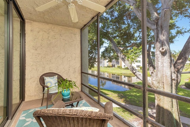 14130 Rosemary Ln Unit 3202, Largo, FL 33774 - sunroom featuring a water view and ceiling fan