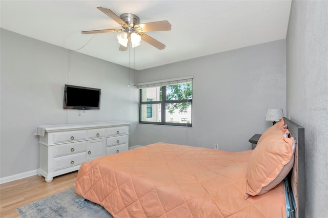14130 Rosemary Ln Unit 3202, Largo, FL 33774 - bedroom featuring wood finished floors and a ceiling fan
