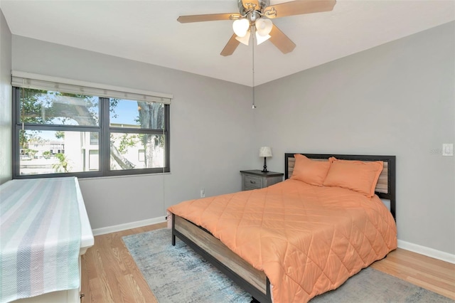14130 Rosemary Ln Unit 3202, Largo, FL 33774 - bedroom featuring wood finished floors and ceiling fan