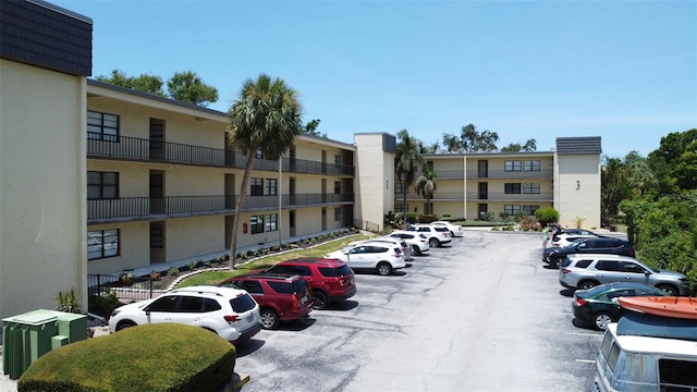 14130 Rosemary Ln Unit 3202, Largo, FL 33774 - view of apartment building / complex featuring uncovered parking