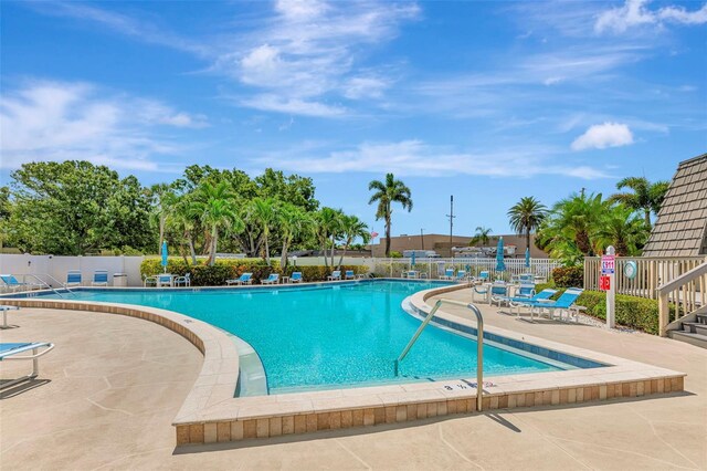 14130 Rosemary Ln Unit 3202, Largo, FL 33774 - community pool with a patio area