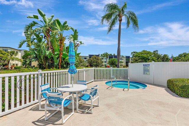 14130 Rosemary Ln Unit 3202, Largo, FL 33774 - view of swimming pool with a patio area