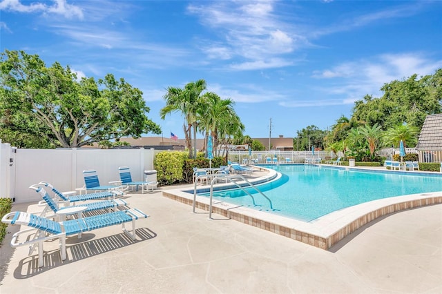 14130 Rosemary Ln Unit 3202, Largo, FL 33774 - community pool featuring a patio