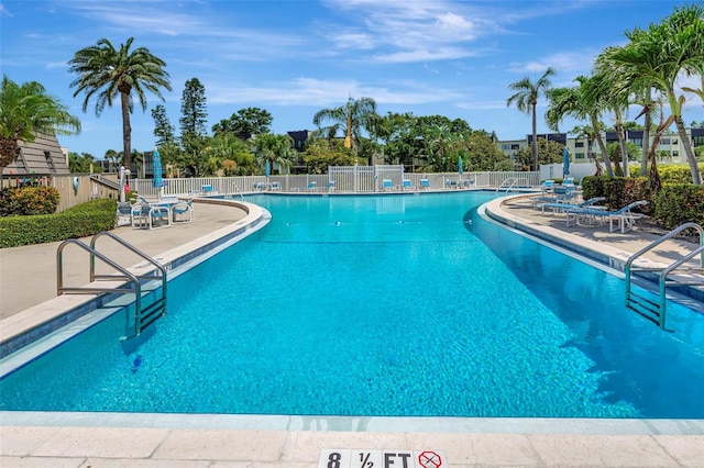 14130 Rosemary Ln Unit 3202, Largo, FL 33774 - community pool featuring a patio area