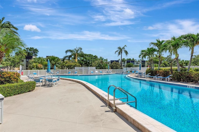 14130 Rosemary Ln Unit 3202, Largo, FL 33774 - community pool featuring a patio area