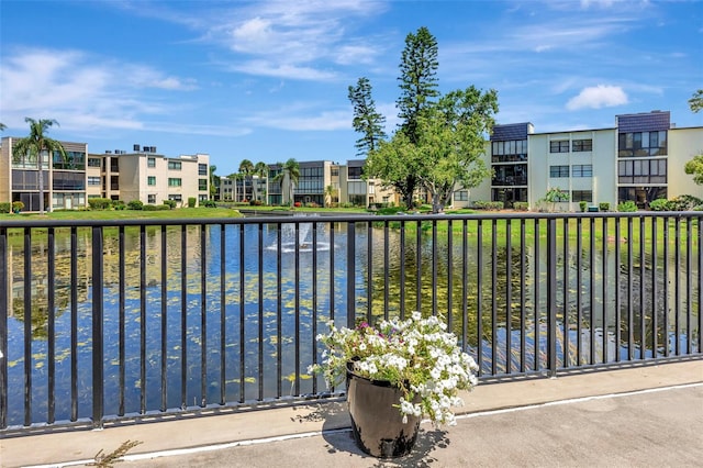 14130 Rosemary Ln Unit 3202, Largo, FL 33774 - balcony with a water view and a residential view