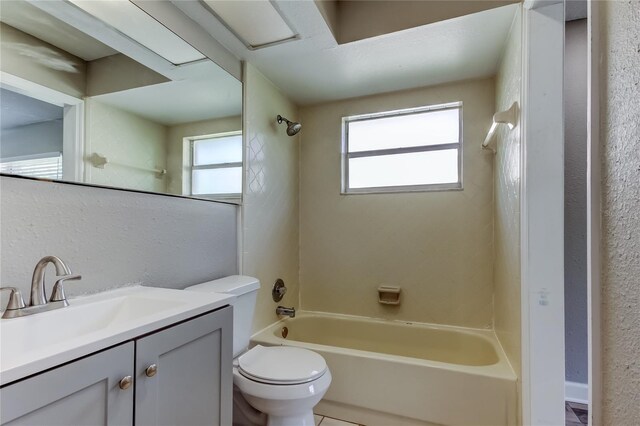 8330 Lafitte Dr, Hudson, FL 34667 - bathroom with bathing tub / shower combination, vanity, and toilet