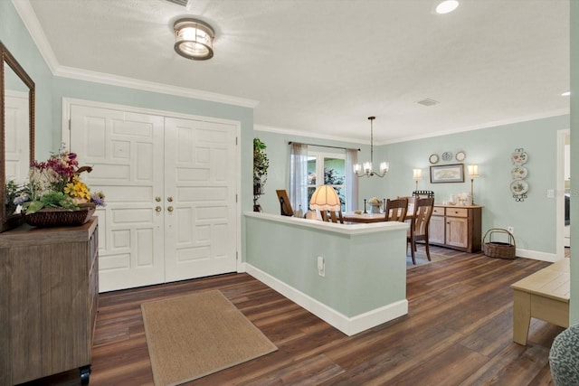 2806 Fairway View Dr, Valrico, FL 33596 - entryway featuring a chandelier, dark wood-type flooring, and crown molding