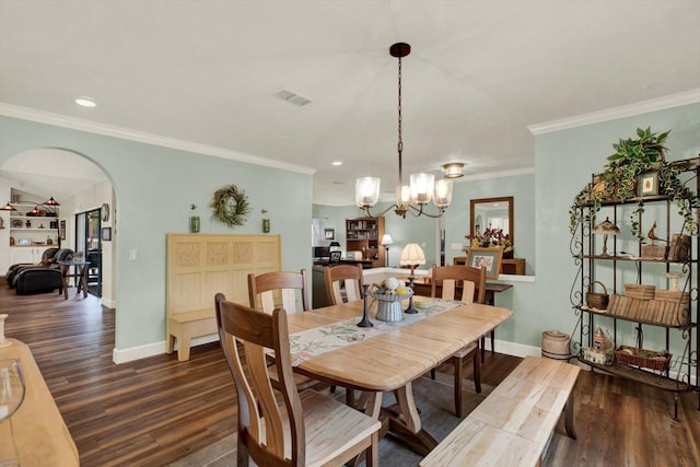 2806 Fairway View Dr, Valrico, FL 33596 - dining space with wood finished floors, a chandelier, arched walkways, crown molding, and recessed lighting
