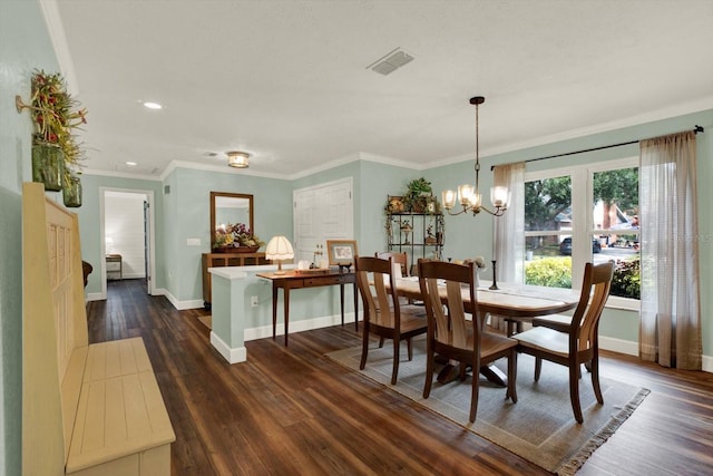 2806 Fairway View Dr, Valrico, FL 33596 - dining area featuring dark wood finished floors, recessed lighting, a chandelier, and crown molding