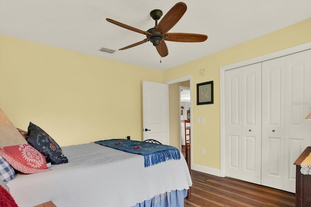 2806 Fairway View Dr, Valrico, FL 33596 - bedroom with dark wood finished floors, a closet, and a ceiling fan