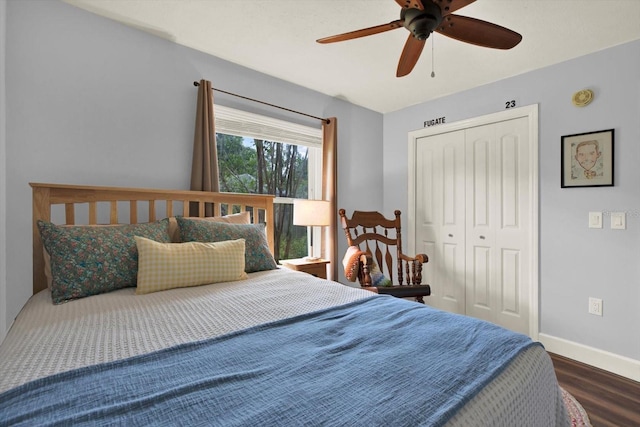 2806 Fairway View Dr, Valrico, FL 33596 - bedroom featuring dark wood-style flooring, a closet, and a ceiling fan