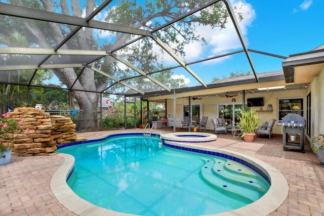 2806 Fairway View Dr, Valrico, FL 33596 - swimming pool with a patio area, ceiling fan, a grill, an in-ground hot tub, and a lanai