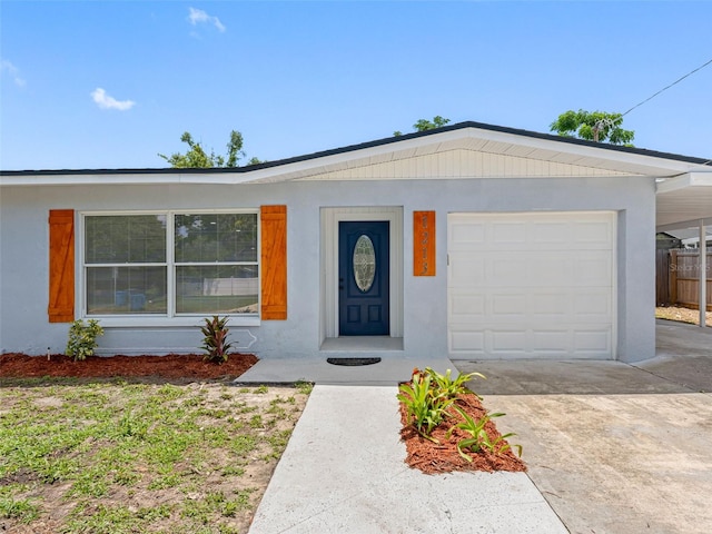 1213 W Camellia Dr, Brandon, FL 33510 - single story home with driveway, a garage, and a carport