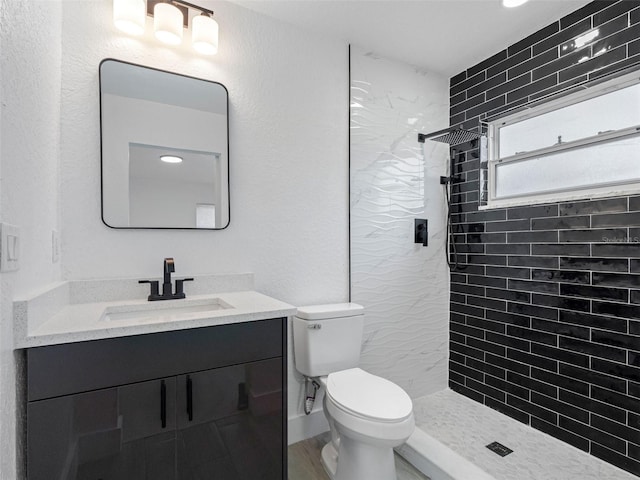 1213 W Camellia Dr, Brandon, FL 33510 - full bathroom featuring vanity, a tile shower, and toilet