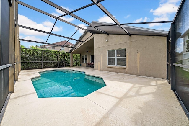 12510 Loquat Way, Tampa, FL 33626 - swimming pool with a patio area, ceiling fan, and glass enclosure