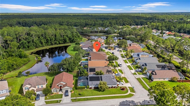 12510 Loquat Way, Tampa, FL 33626 - view of property location with a heavily wooded area, a nearby body of water, and nearby suburban area