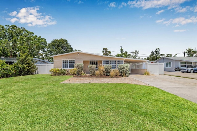 2861 Pinellas Point Dr S, Saint Petersburg, FL 33712 - ranch-style house featuring concrete driveway and an attached carport