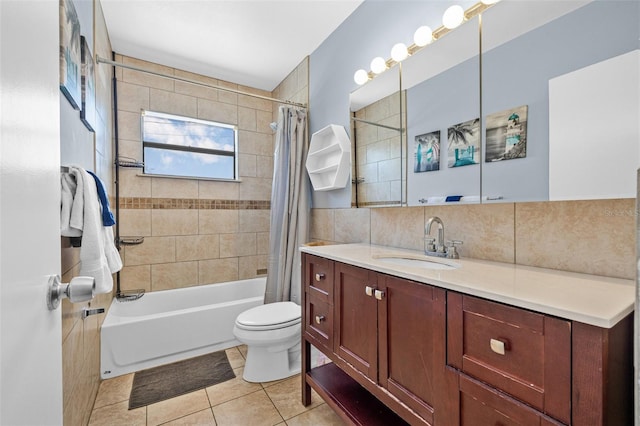 2861 Pinellas Point Dr S, Saint Petersburg, FL 33712 - full bathroom featuring shower / bath combo, vanity, toilet, tile patterned flooring, and decorative backsplash