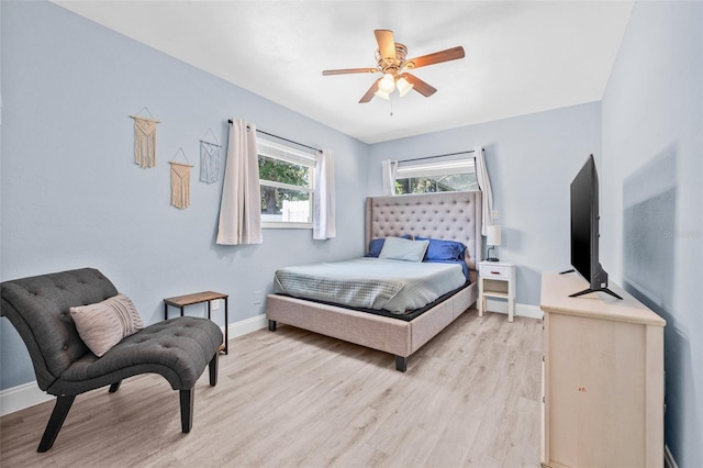 2861 Pinellas Point Dr S, Saint Petersburg, FL 33712 - bedroom with light wood-type flooring, baseboards, and a ceiling fan