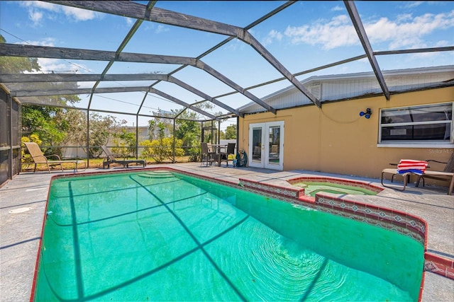 2861 Pinellas Point Dr S, Saint Petersburg, FL 33712 - view of swimming pool with french doors, a patio area, a lanai, and a pool with connected hot tub