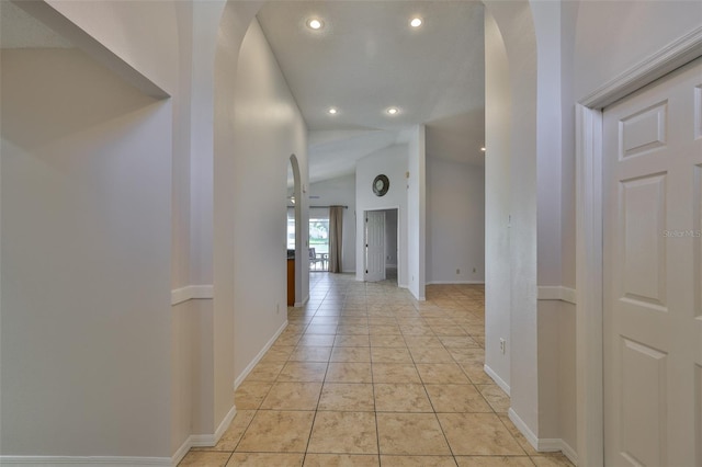 2021 Elk Spring Dr, Brandon, FL 33511 - hallway with recessed lighting, vaulted ceiling, arched walkways, and baseboards