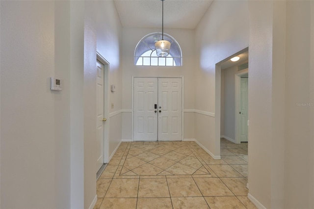 2021 Elk Spring Dr, Brandon, FL 33511 - foyer with light tile patterned floors
