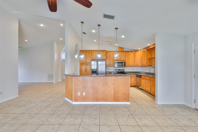 2021 Elk Spring Dr, Brandon, FL 33511 - kitchen featuring appliances with stainless steel finishes, ceiling fan, a sink, baseboards, and dark stone countertops