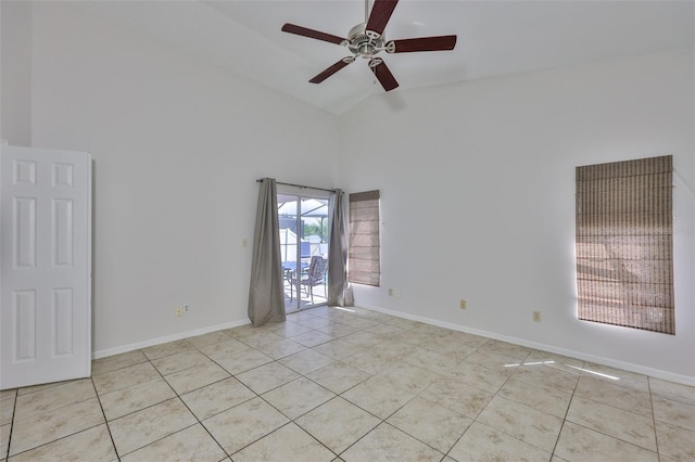 2021 Elk Spring Dr, Brandon, FL 33511 - empty room with high vaulted ceiling, light tile patterned flooring, ceiling fan, and baseboards