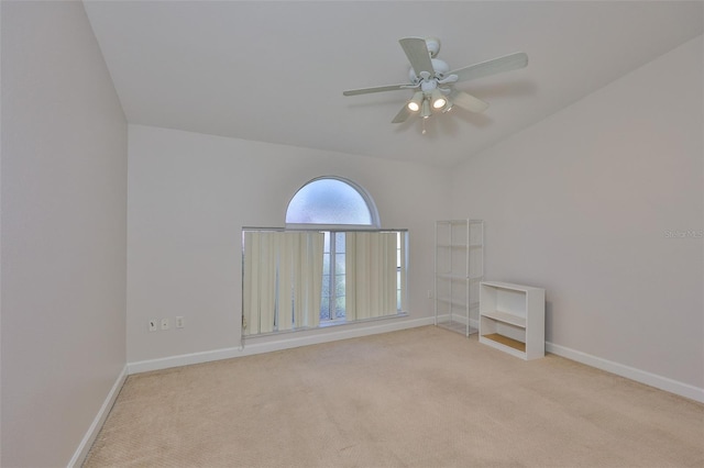 2021 Elk Spring Dr, Brandon, FL 33511 - unfurnished room with light carpet, baseboards, ceiling fan, and lofted ceiling