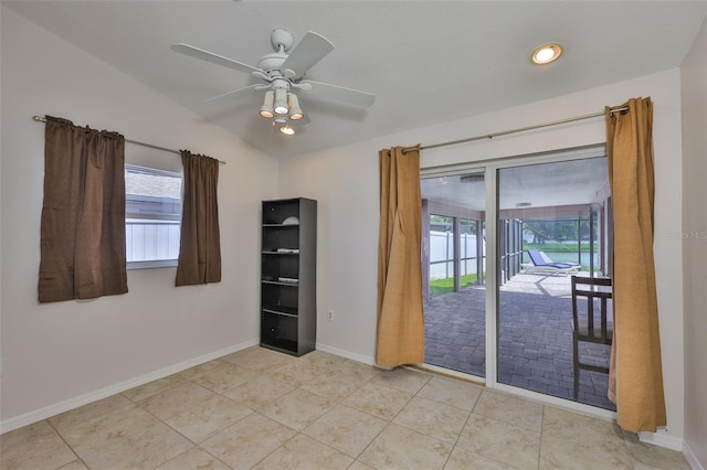 2021 Elk Spring Dr, Brandon, FL 33511 - empty room featuring a ceiling fan, baseboards, light tile patterned flooring, and vaulted ceiling