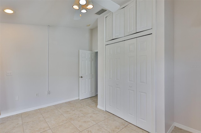 2021 Elk Spring Dr, Brandon, FL 33511 - unfurnished bedroom with light tile patterned flooring, baseboards, a closet, and recessed lighting