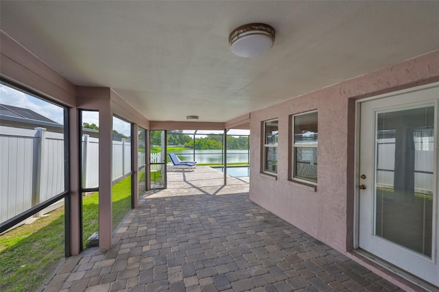 2021 Elk Spring Dr, Brandon, FL 33511 - unfurnished sunroom with a water view
