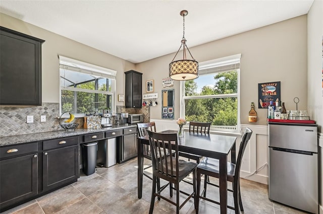4151 Little Gap Loop, Ellenton, FL 34222 - dining area featuring light tile patterned floors