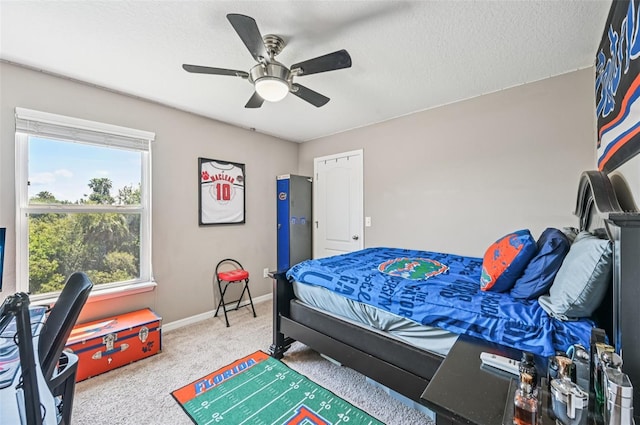 4151 Little Gap Loop, Ellenton, FL 34222 - carpeted bedroom featuring a ceiling fan and a textured ceiling
