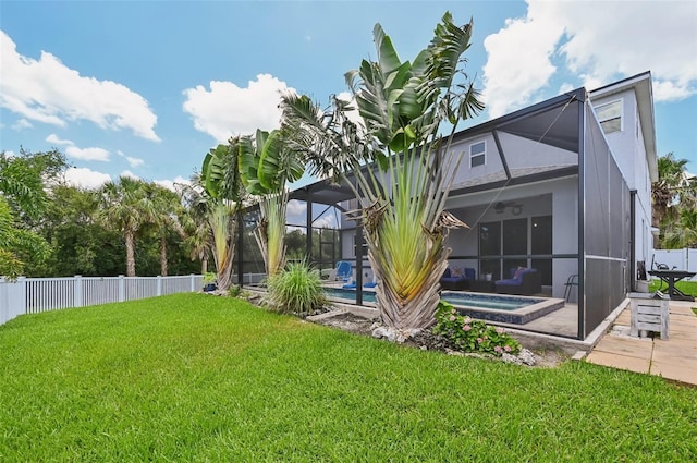 4151 Little Gap Loop, Ellenton, FL 34222 - back of house with a fenced backyard, a patio area, an outdoor hot tub, and a lanai