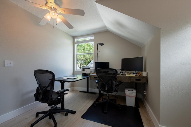 346 Gray Oak Dr, Tarpon Springs, FL 34689 - office area featuring vaulted ceiling, wood finished floors, ceiling fan, and baseboards