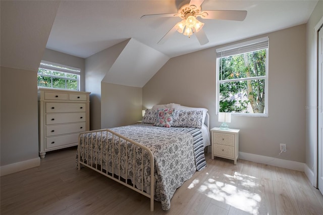 346 Gray Oak Dr, Tarpon Springs, FL 34689 - bedroom featuring lofted ceiling, light wood-type flooring, baseboards, and ceiling fan